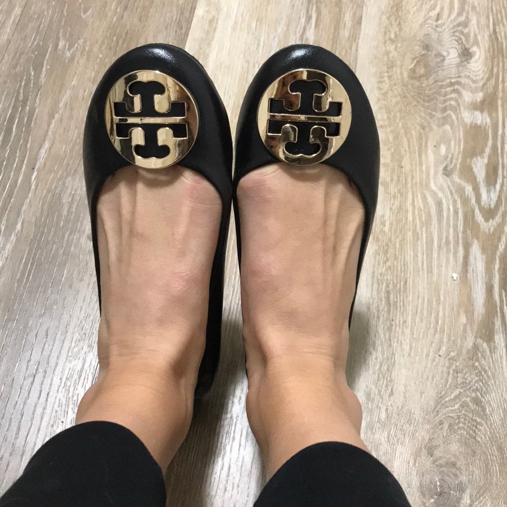 Tory inspired black flats